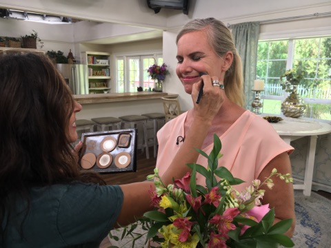 Kit gets makeup checks.