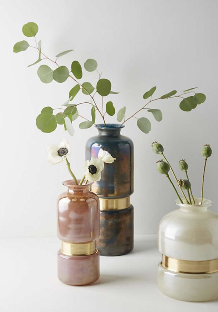These cinched gold vases are lovely and elegant from Anthropologie.com.