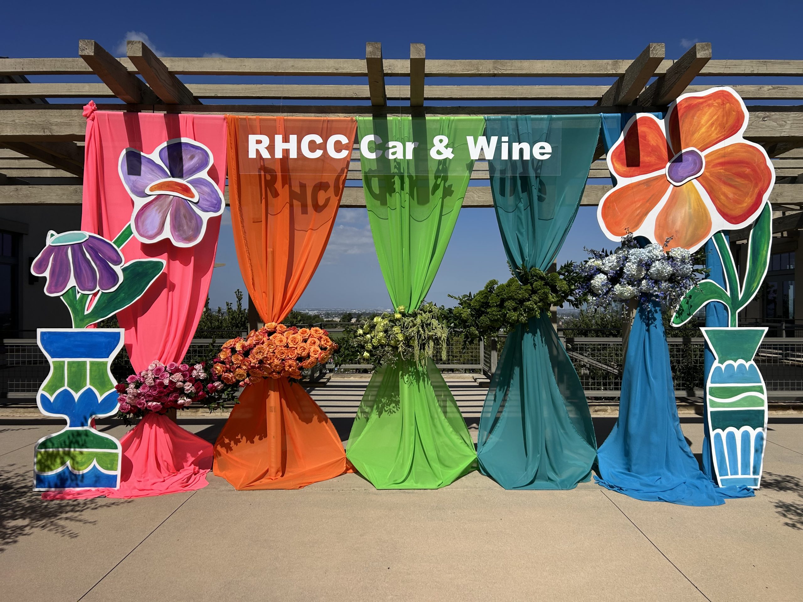 Custom Event Flowers at the RHCC Wine and Car show by Flower Duet